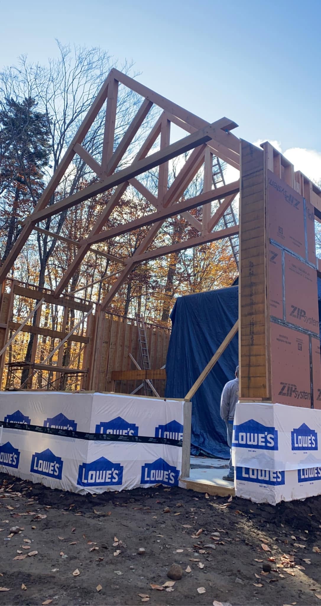 Exterior build in progress — framing and ZIP system sheathing during construction