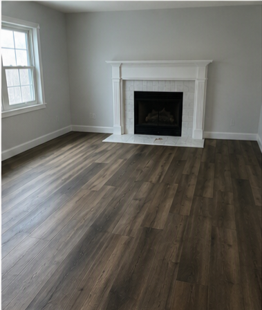 Living room renovation — new luxury vinyl plank flooring and refinished fireplace